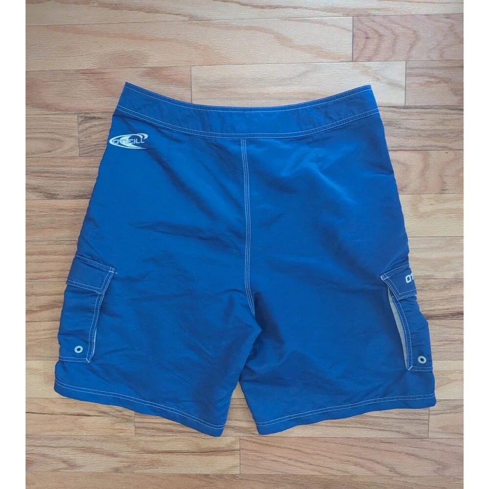 Vintage O'Neill Boardshorts Blue White Cargo Pockets Shiny Surf Wax Comb Size 34